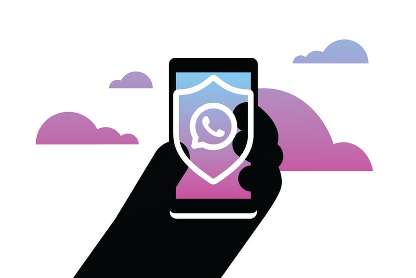 WhatsApp 2FA Hand holing up a mobile device with the WhatsApp logo inside a shield