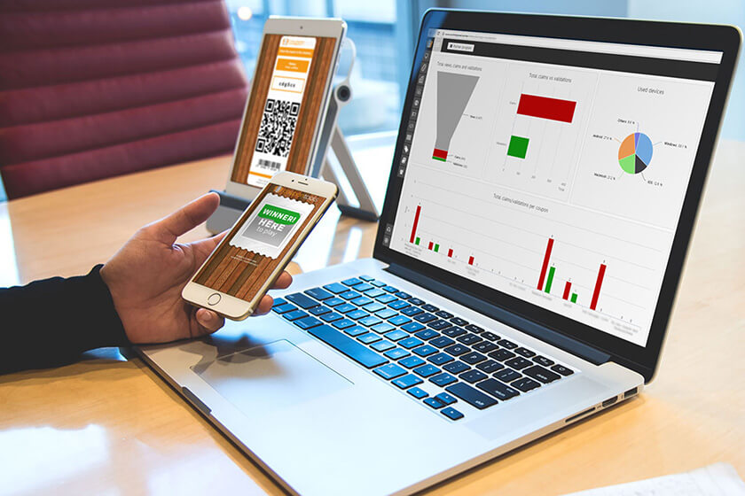 Coupon Tools page image Photo of a person holding a phone with the Coupon Tools app
